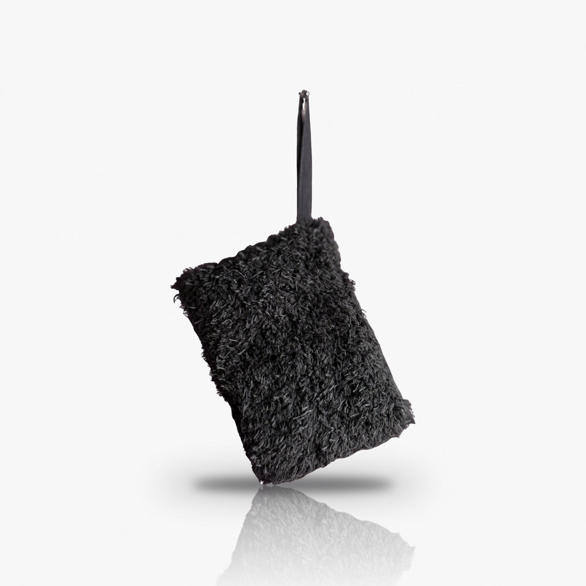 The Essential Wash Pad black microfibre wash pad with strap