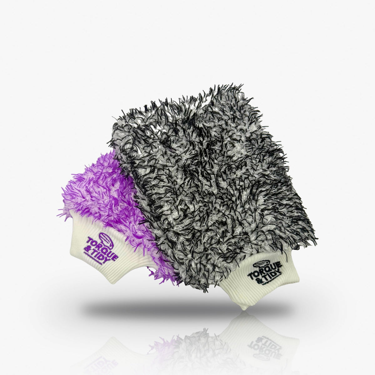 The Premium Wash Mitt in purple and black, side by side