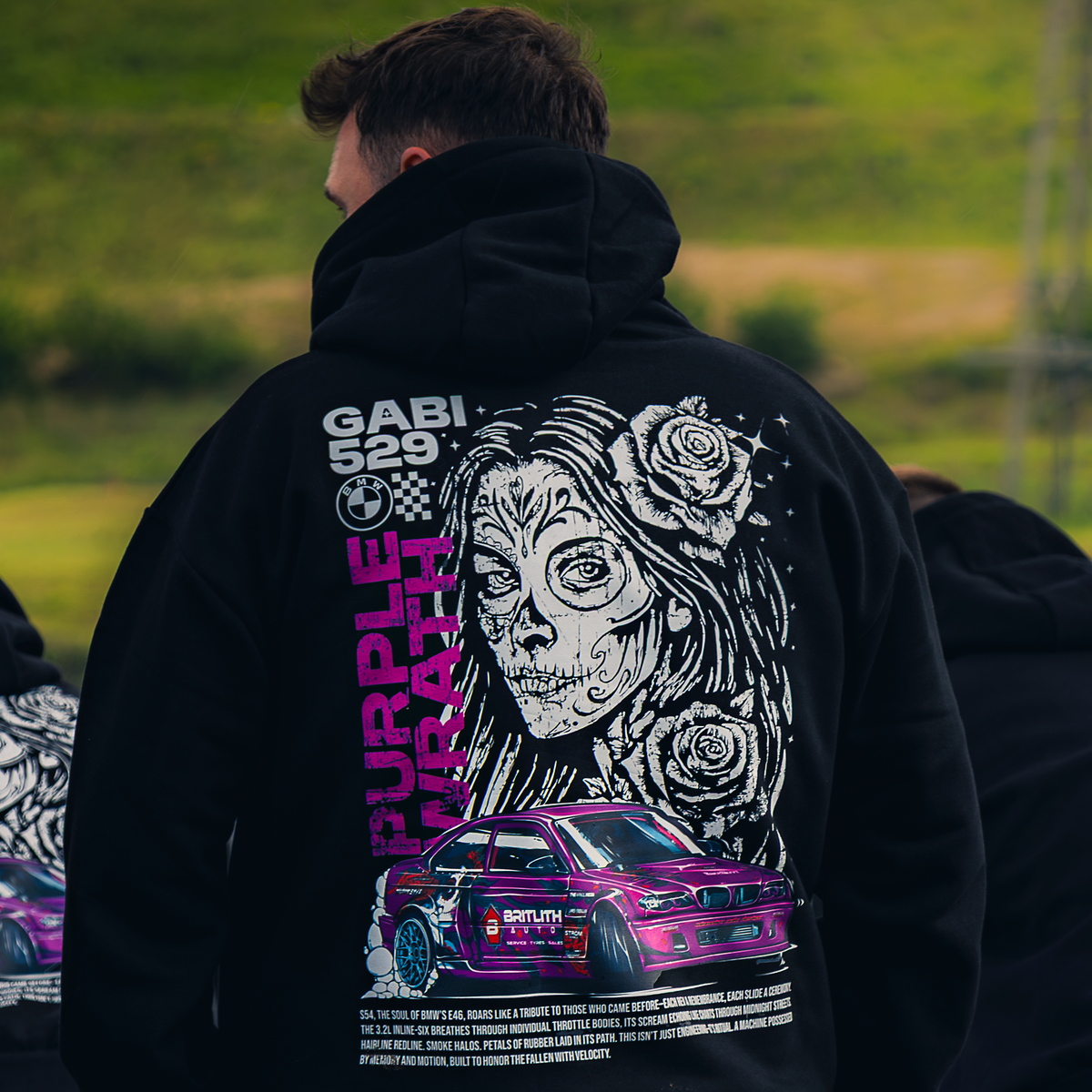 Wearing the GABI 529 Hoodie at a drift event, back view