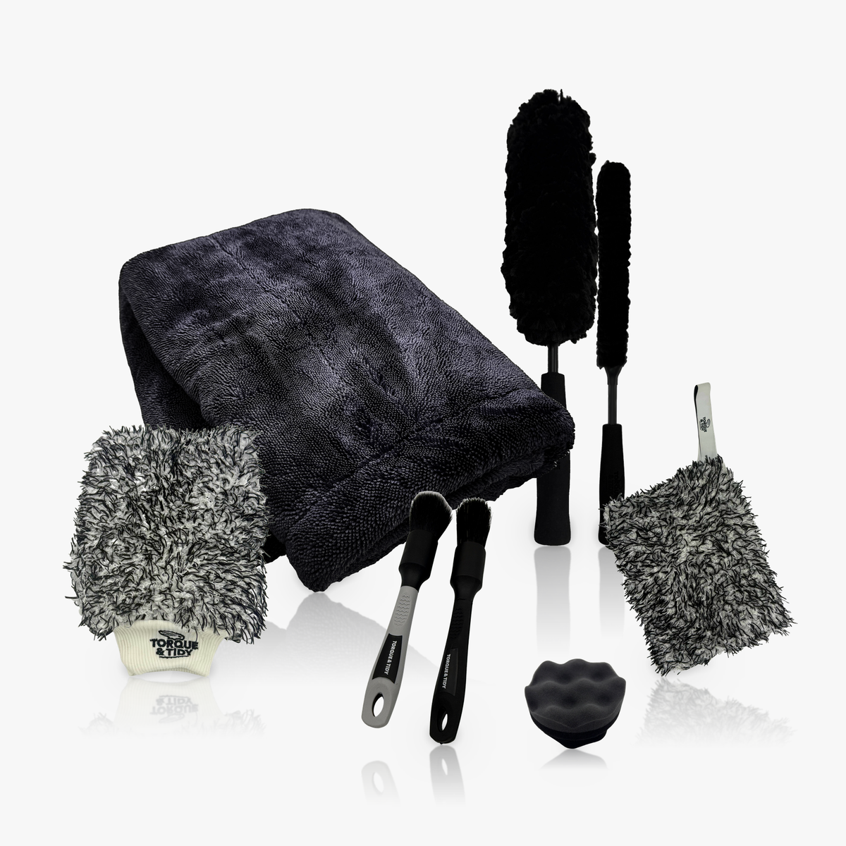 The Black Accessories Bundle: Dry Towel, wash mitt, wash pad, wheel wands, detailing brushes and tyre applicator