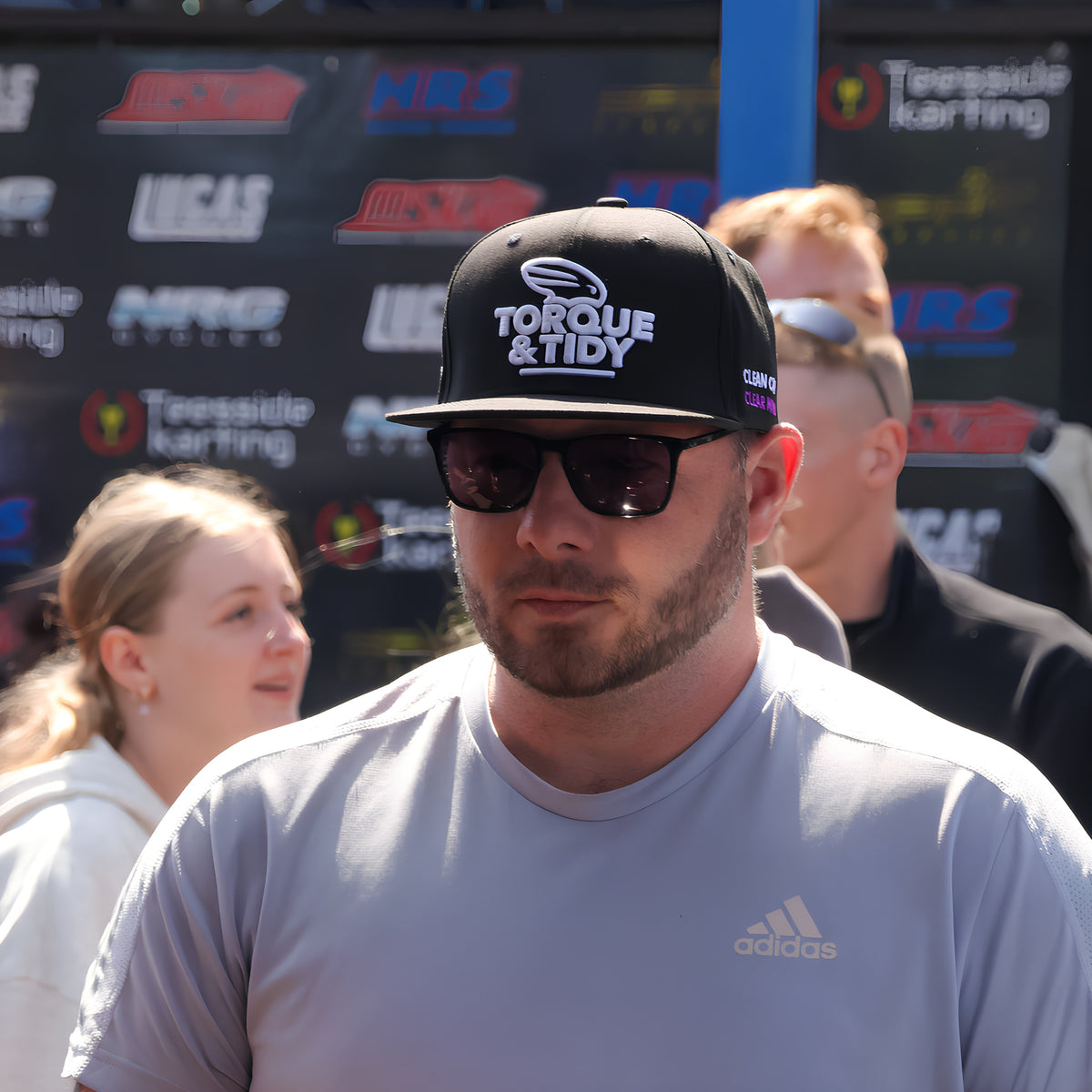 Wearing The Community Snapback at a drift event