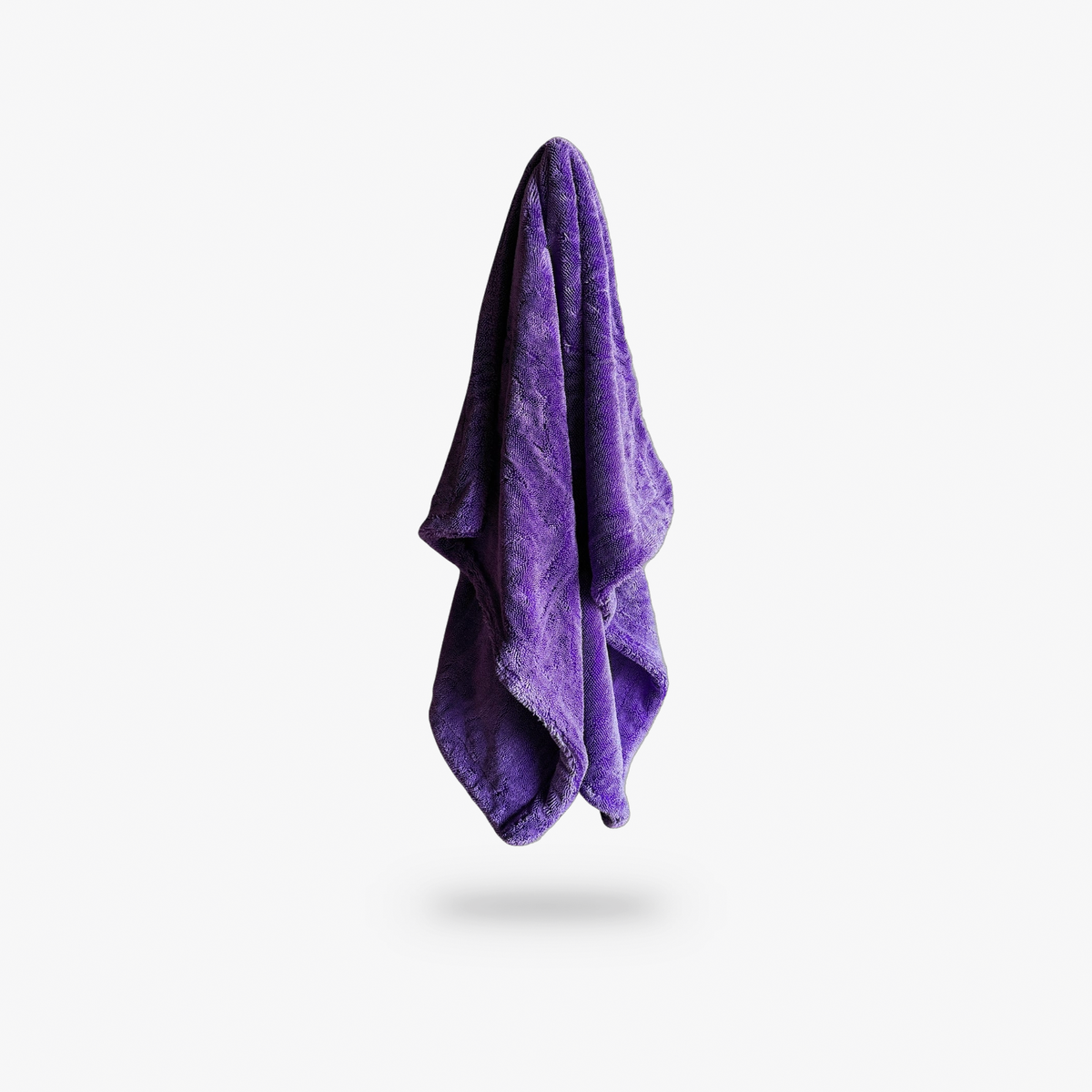 The Dry Towel in purple, hanging