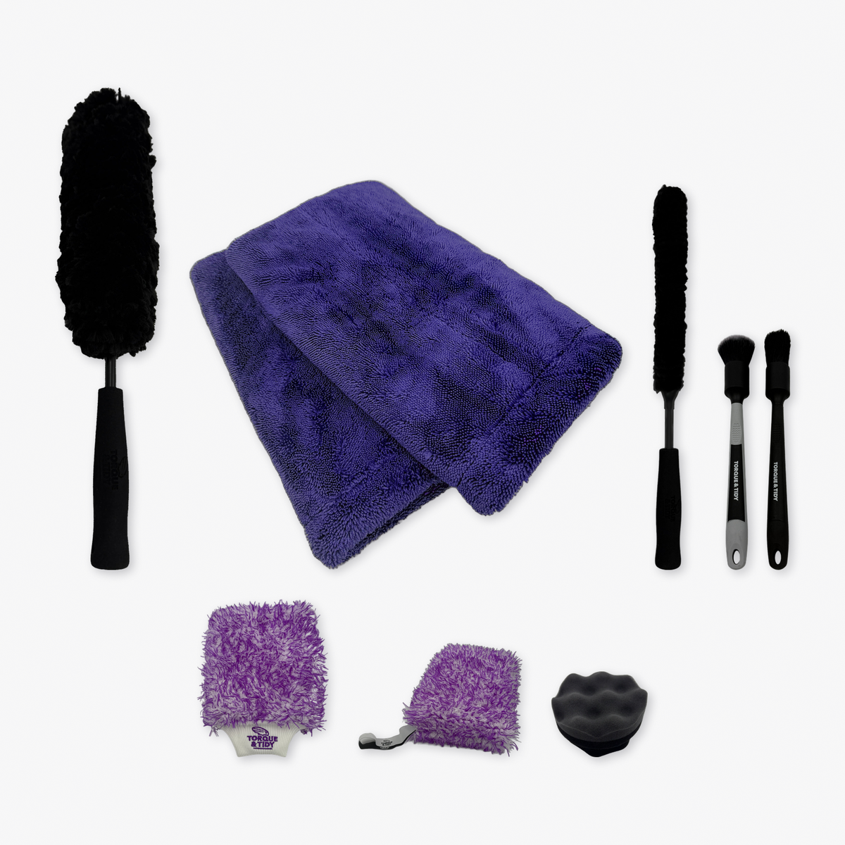 What's inside The Purple Accessories Bundle: wheel wands, brushes, Dry Towel, mitt, pad and applicator laid out