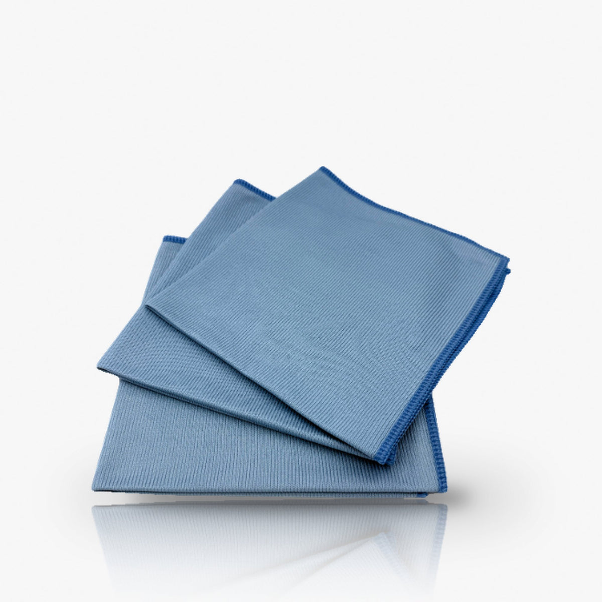 The Glass Cloth, three folded light blue microfibre glass cloths