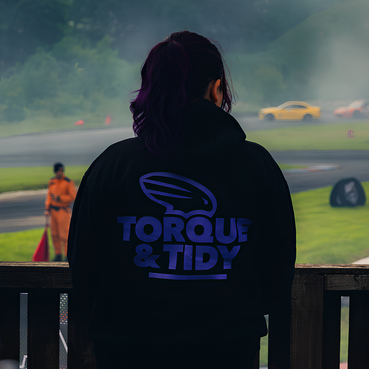 The OG Hoodie worn at a drift event, purple Torque & Tidy back print