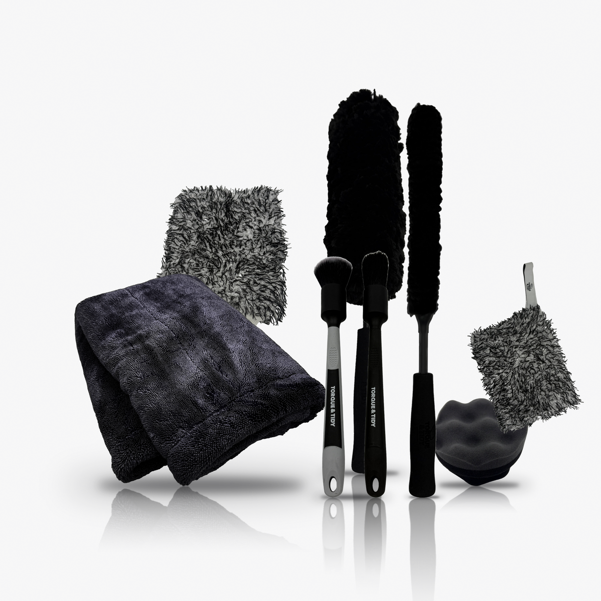 The Black Accessories Bundle: Dry Towel, wash mitt, wash pad, wheel wands, detailing brushes and tyre applicator