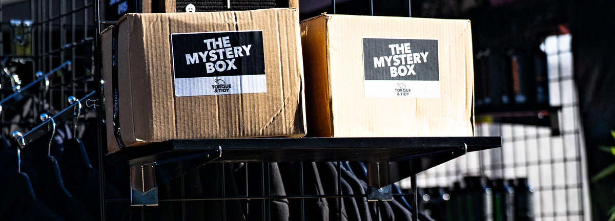 Torque & Tidy Mystery Boxes on the stand rack