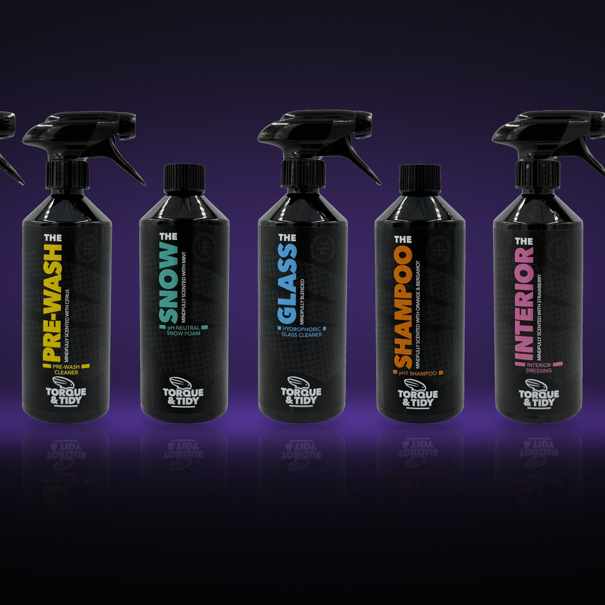 The Torque & Tidy range of car care bottles on a dark purple background
