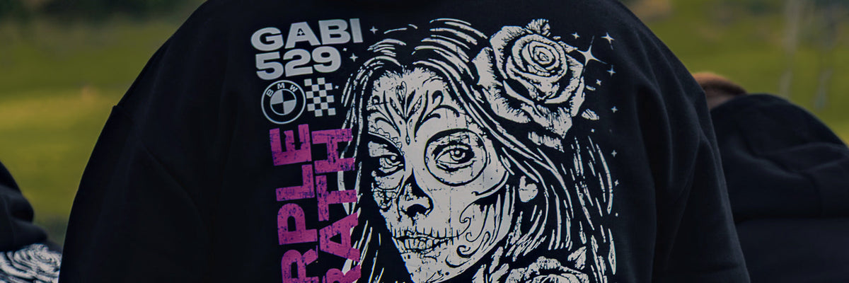 The GABI 529 hoodie back print, worn at the track
