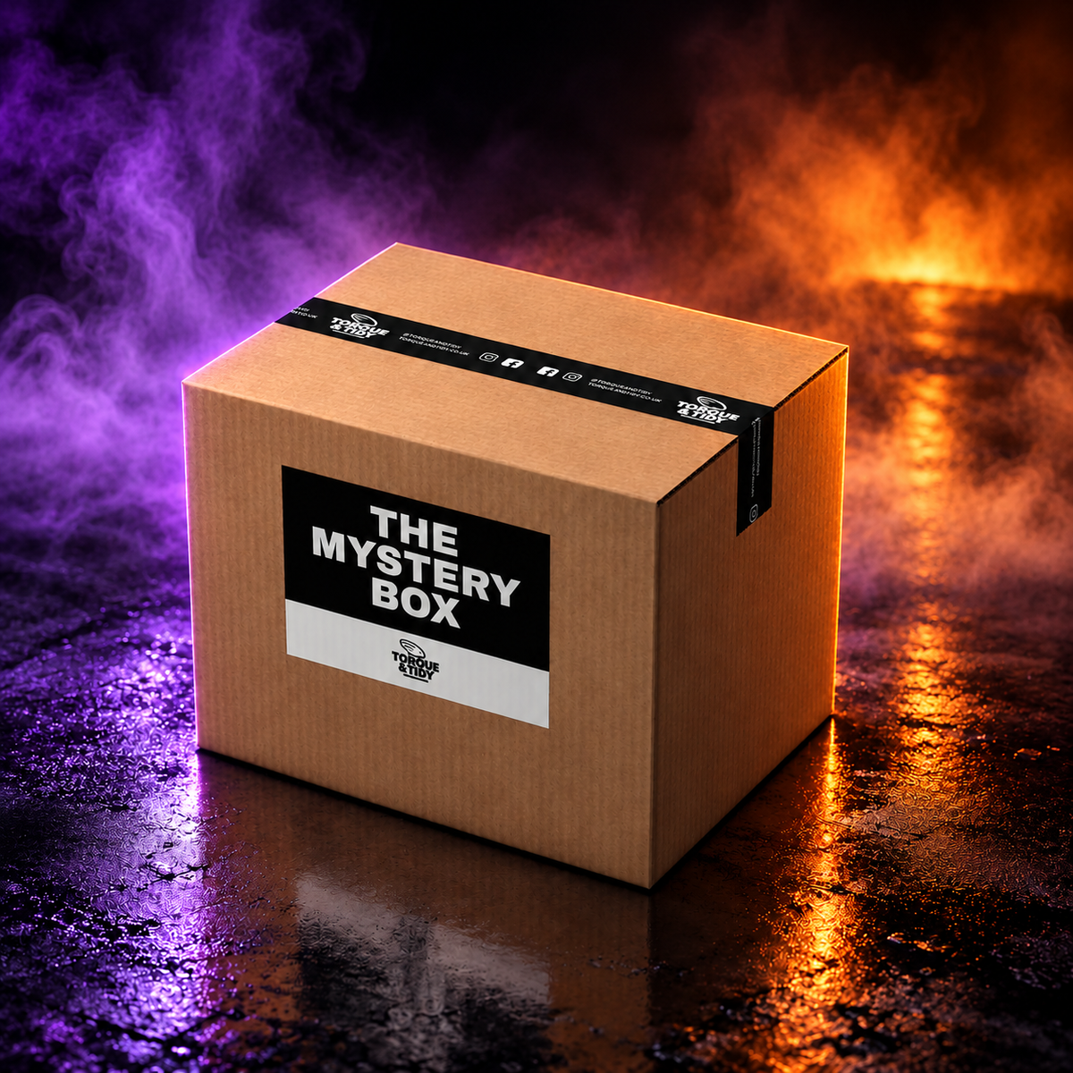 The Trick or Treat Mystery Box (The Treat, Medium) on a smoky wet floor