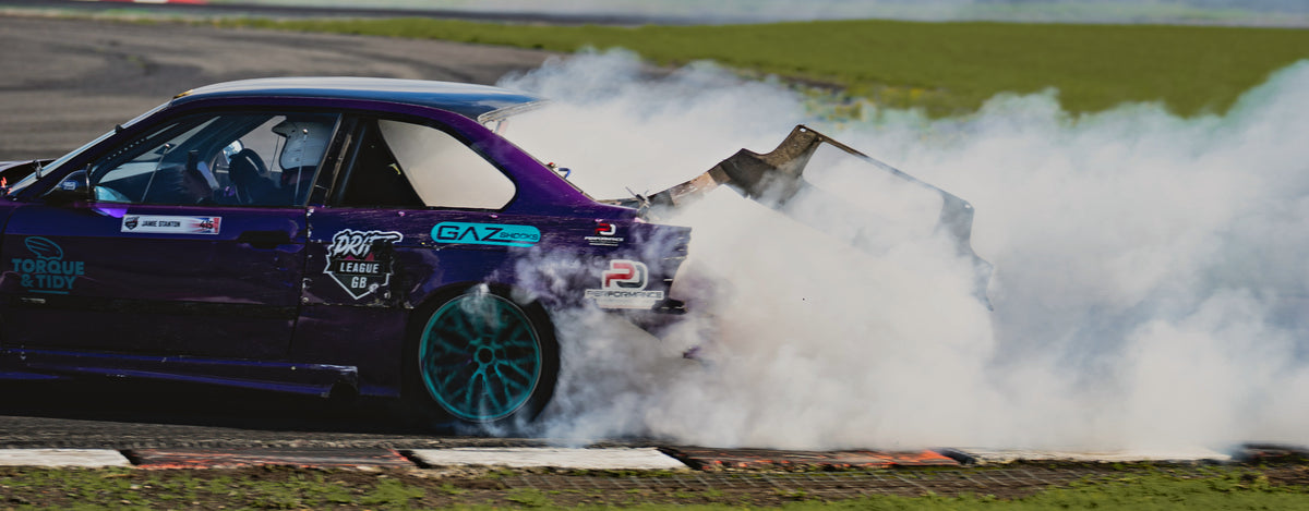 The Torque & Tidy car sideways in tyre smoke at Drift League GB