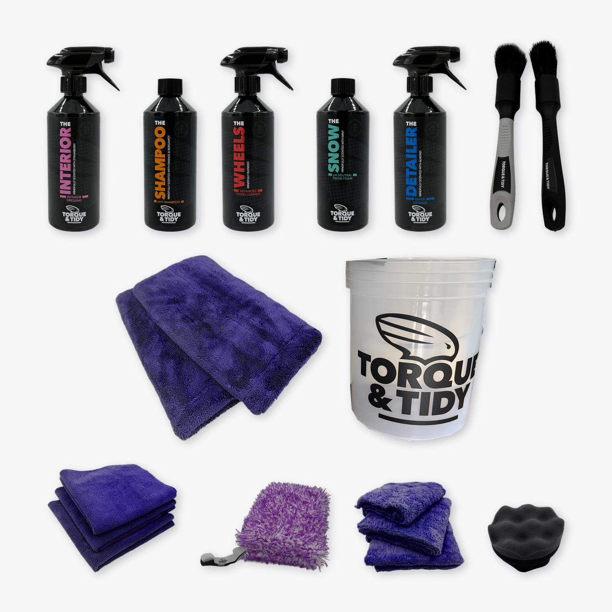 What's inside The Starter Bundle: five bottles, Wash Bucket, Dry Towel, GP and Buff Cloths, wash pad, brushes and tyre applicator laid out
